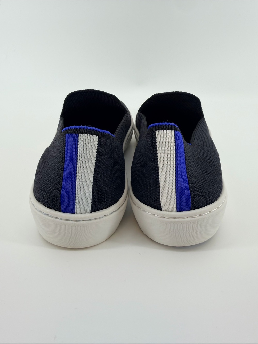 Rothy's Black Knit Original Slip-On Sneakers with Blue & White Heel Tabs - Picture 6 of 7